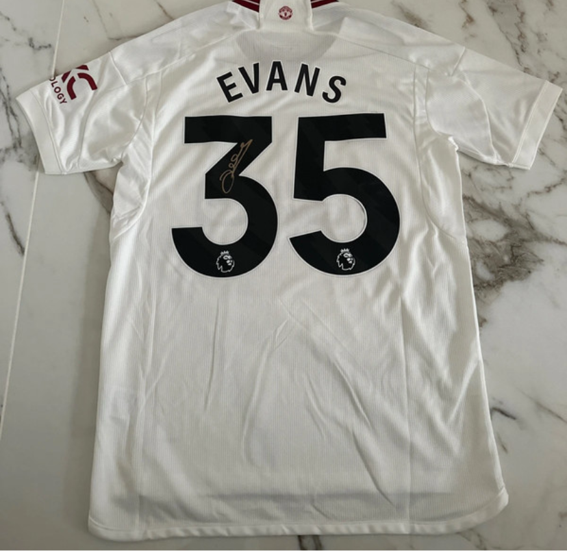 Jonny Evans hand signed Manchester United away kit 23-24