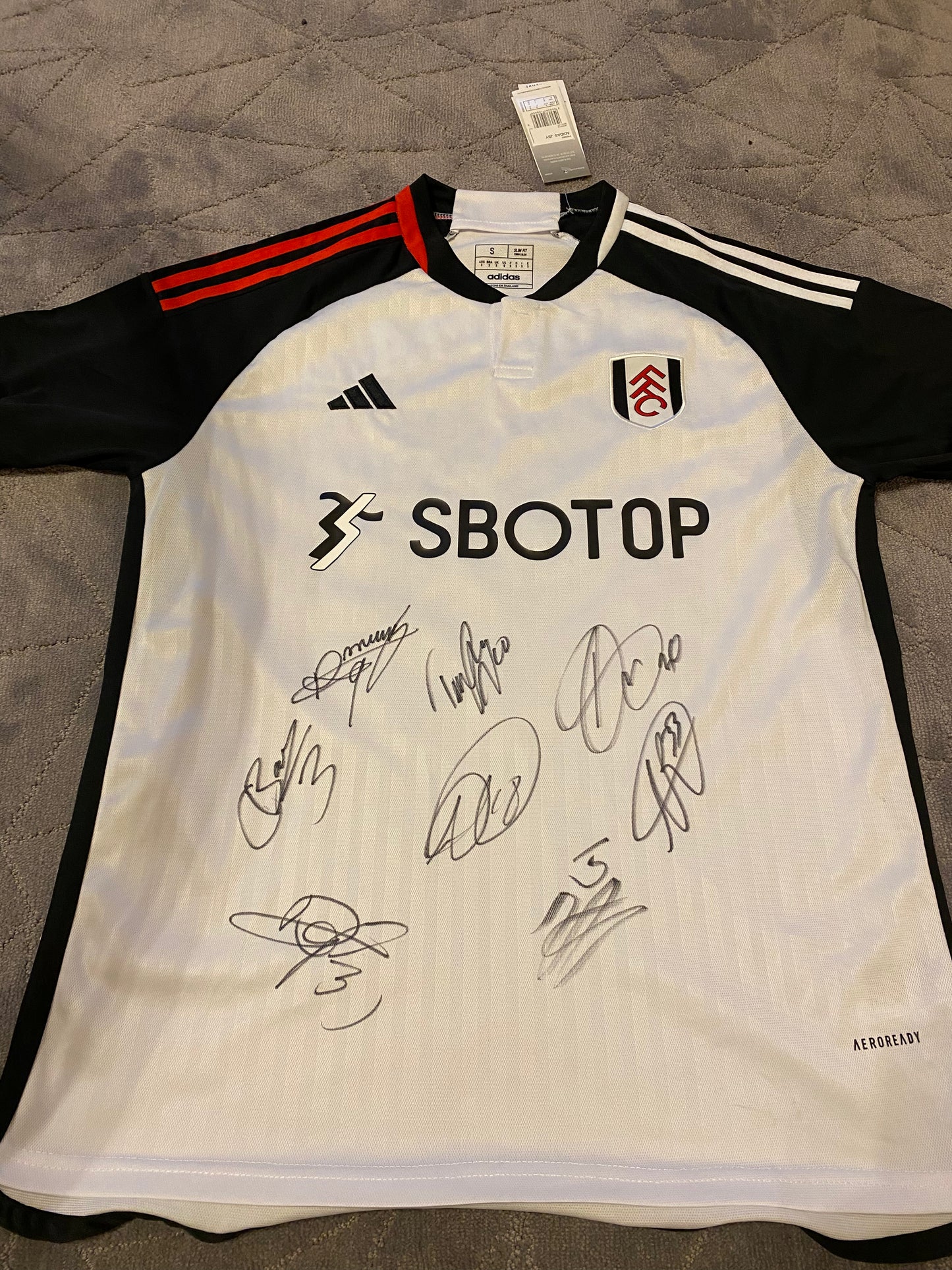 Fulham multi signed shirt